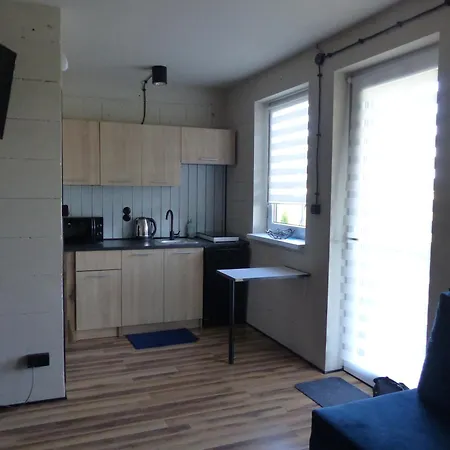 Na Ksiezycu Деревянный коттедж Karwienskie Bloto